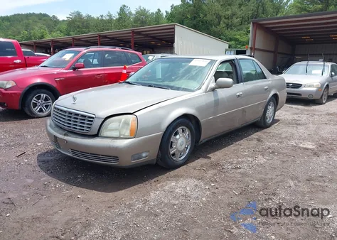 2003 Cadillac Deville Standard z USA, uszkodzony, nr VIN 1G6KD54Y33U168709